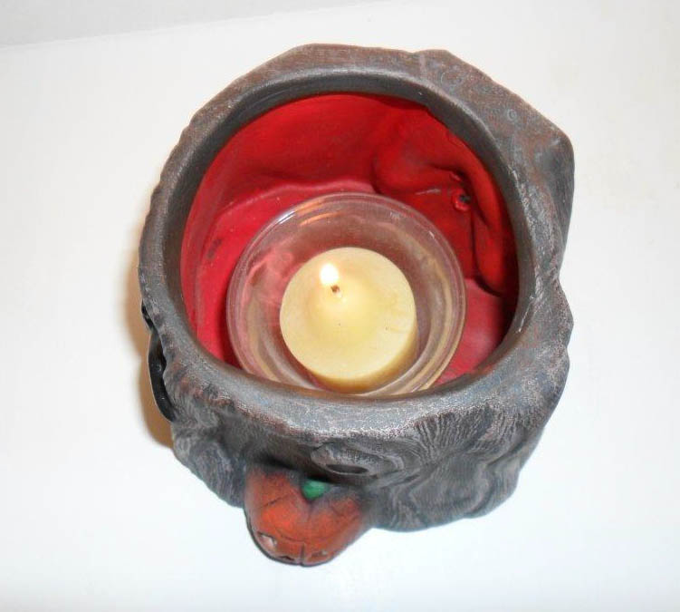 Ceramic painted haunted stump candle holder