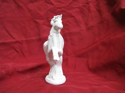 Ceramic unpainted fairy on a unicorn