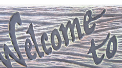 Ceramic welcome to our nest blue jay sign