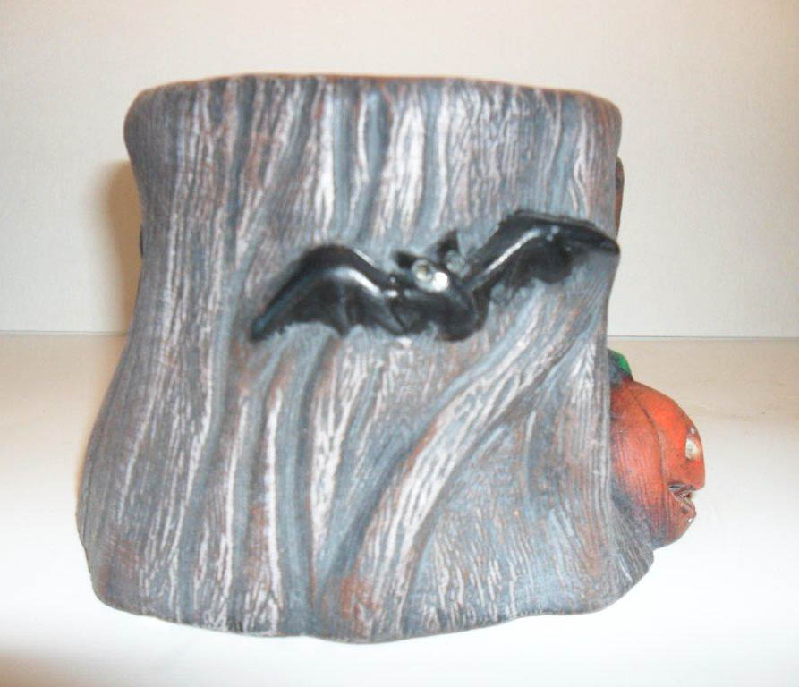 Ceramic painted haunted stump candle holder