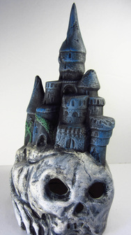 Hand painted ceramic castle on a skull